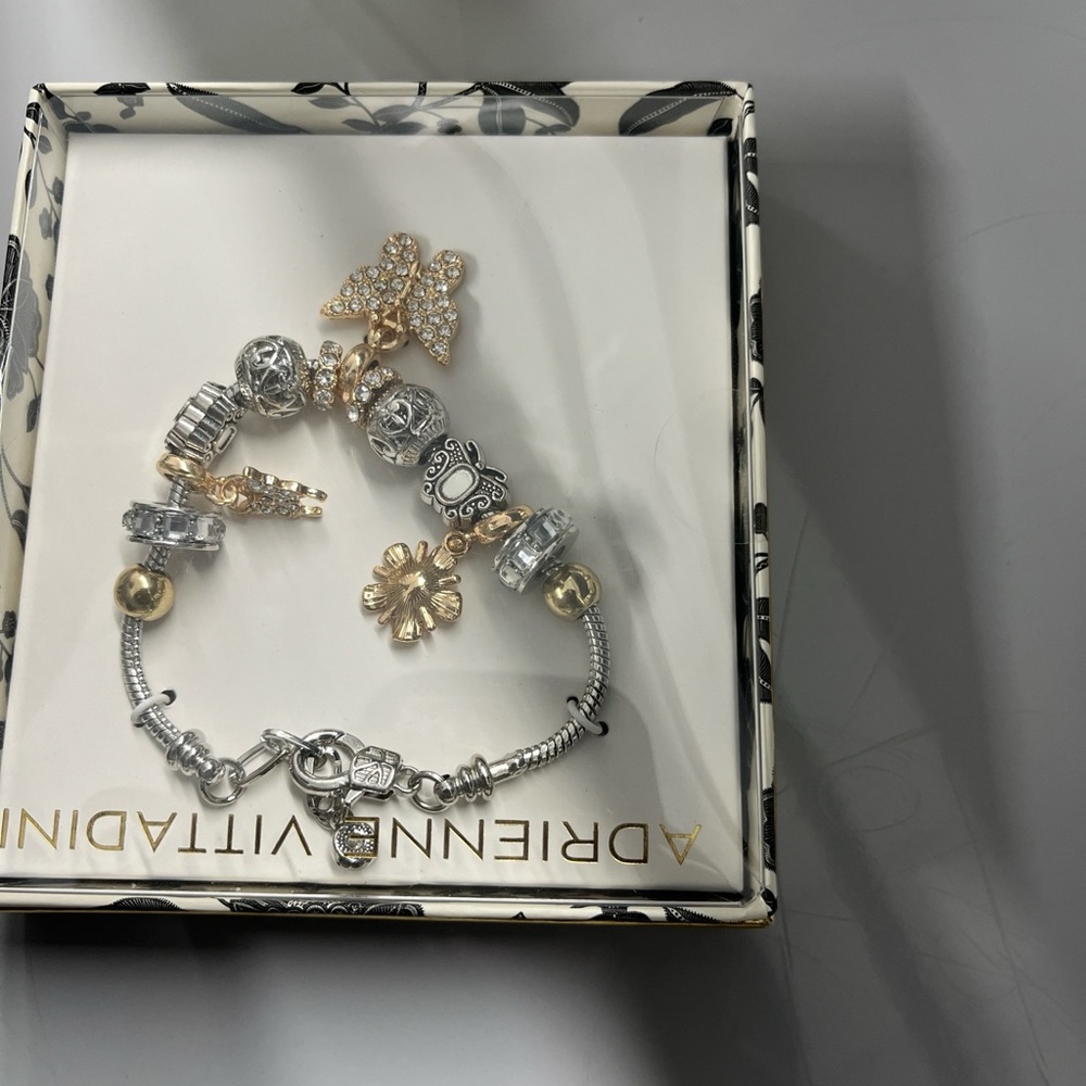 Adrienne Vittadini Gold and Silver Charm Bracelet with Crystals